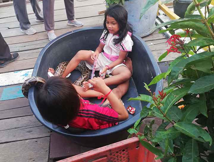 Playing beside Tonle Sap Lake